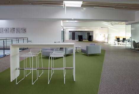 afpasset Fraster tæppe grøn på kontor